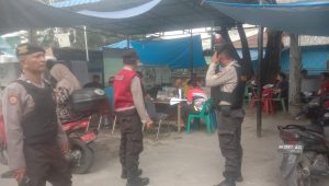 Team Patroli Perintis Polres Pelabuhan Belawan Memantau Kegiatan Rekapitulasi Suara di PPK Belawan, Medan Labuhan, dan Medan Marelan