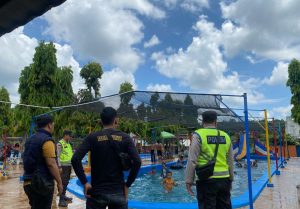 Personil Polsek Tanjung Raja Lakukan Giat Pengamanan di Lokasi Objek Wisata