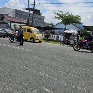 Polsek Raya Pastikan Kelancaran Lalu Lintas dan Keamanan di Jalan Sutomo