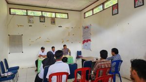 Bhabinkamtibmas Polsek Binuang Menghadiri Kegiatan Rapat Evaluasi Kinerja Aparat Desa