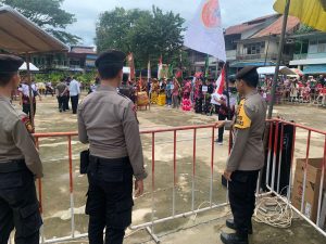 Personel Polres Melawi dan Polsek Nanga Pinoh Melaksanakan Pengamanan Kegiatan Open Turnamen Barongsai