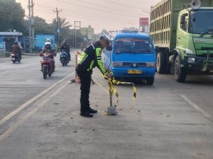 Keselamatan Terjamin: Anggota Lalu Lintas Polsek Kramatwatu Polresta Serkot Polda Banten Siaga di Pusat Pengaturan Arus Kendaraan