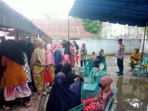 Pastikan Pendistribusian Beras Berjalan Kondusif, Polres Tanjung Balai Hadir di Lokasi Kegiatan
